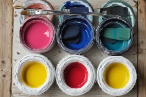 Sarah Johnson's colorful paint supplies and brushes